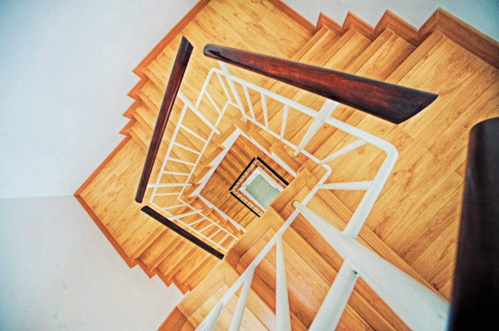 A seemeingly endless wooden staircase.